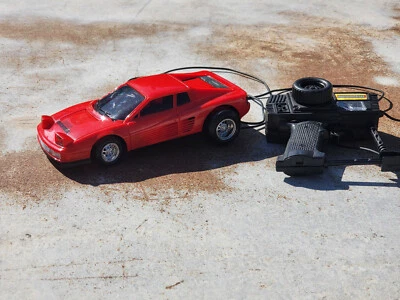 New Bright 1989 RC Ferrari Testarossa mit Kabelfernbedienung Vintage 1:18 - Bild 1 von 4