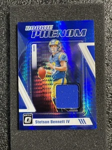2023 Donruss Optic Football Rookie Phenom Jersey Relics Stetson Bennett IV Rams - Bild 1 von 2