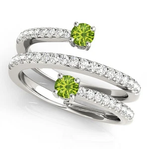 Anillo giratorio de piedras preciosas de peridoto y diamantes dúo espiral de peso total de 0,50 quilates - Imagen 1 de 3