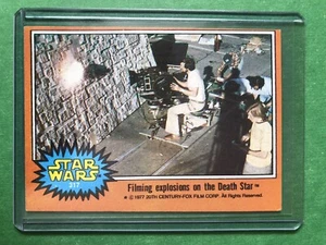 1977 Topps Star Wars  #317 Filming explosions on the Death Star - Picture 1 of 2