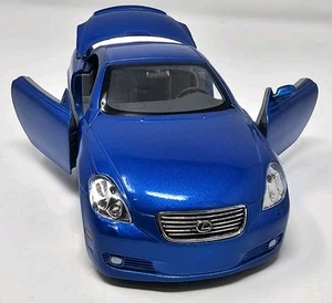 JADA DUB CITY 1/24 LEXUS SC430  (Candy Blue) W/Cartelli Rims - Picture 1 of 15