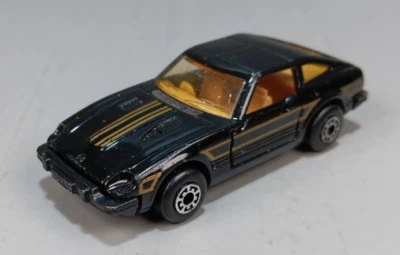 Matchbox 1982 Macau Datsun 280ZX 2+2 ribete oro negro Foto 1 de 4