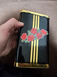 Vintage tin box, black and gold with red roses. - Picture 1 of 2
