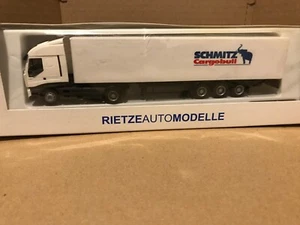 Rietze 1:87 HO Iveco Stralis Tractor Unit and Schmit Cargobull box trailer White - Picture 1 of 2