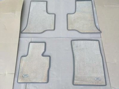 Juego de alfombrillas beige arena Land Rover Range Rover 2003-2006 OEM EAH000320SUN Foto 1 de 4