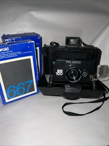 Polaroid EE100 analoge Sofortbildkamera klappbar; 2 Boxen s/w Film; ungetestet - Bild 1 von 10