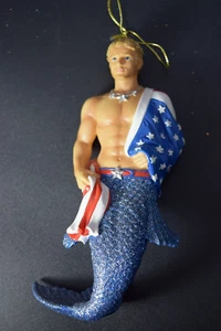 DECEMBER DIAMONDS STRIPE #55-90810 ORNAMENT 7" TALL MERMAN AMERICAN FLAG - Picture 1 of 6