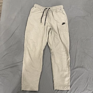 Pantalones de cercanías Nike Sportswear Tech tejidos forrados adoquines DQ4343-016 pequeños - Imagen 1 de 15