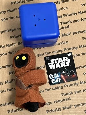 Muñequera de peluche Star Wars Cutie Cuff JAWA Snap, Hug, & Go Foto 1 de 3