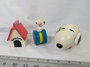 Peanuts Snoopy Doghouse Rolling Wheel Cartoon Panel Toy Lot - Imagen 1 de 9