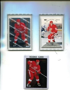 1996-97 Select #97, Donruss Canadian Ice 129, Zenith 118, Thomas Holmstrom tutti e 3 - Foto 1 di 2