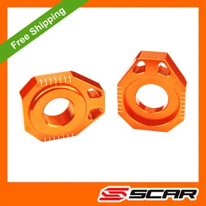 CHAIN ADJUSTER KTM 125 150 250 300 350 450 SX SX-F XC XC-F SMR 02-12 ORANGE SCAR - Picture 1 of 2