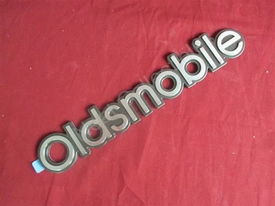 NOS OEM Oldsmobile Bravada Rear End Gate Nameplate Emblem 1996 - 2001 - Image 1 of 4