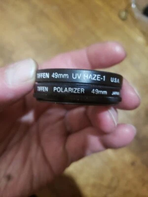 Tiffen 49mm Filters, 1 Uv Hase USA, Polarizer  Japan - Image 1 of 4