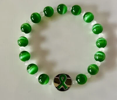 Pulsera elástica conciencia cinta verde enfermedad de Lyfoma, riñón y Lyme ¡OFERTA! Foto 1 de 4