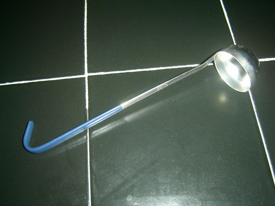 Vollrath 58322, Ladle with Plastic Coated Dark Blue Handle, 2-Ounce - Image 1 of 1