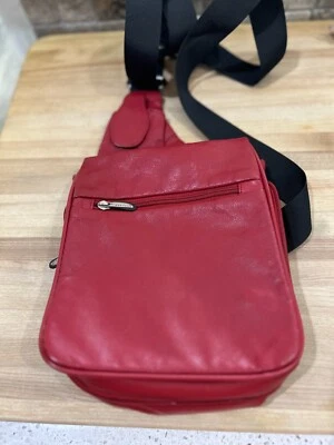 Travelon Crossbody PurseSling Bag Red Leather Pockets Adjustable Black Strap - Image 1 of 4
