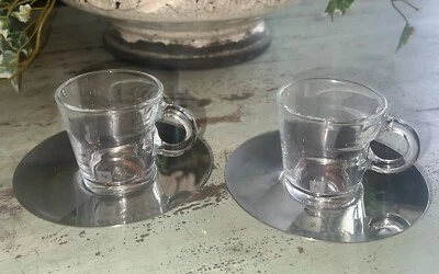 Conjunto de 2 xícaras de café expresso e pires de aço inoxidável de vidro transparente Nespresso 2" de altura - Imagem 1 de 4