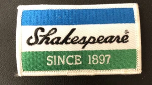 Parche bordado carretes de aparejos de pesca Shakespeare desde 1897 - Imagen 1 de 2