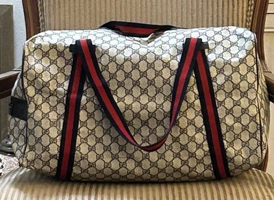 Bolso de lona y accesorios Gucci vintage años 70 con adornos de cuero para fin de semana  Foto 1 de 4