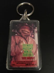 VINTAGE 1990 MIRAGE TMNT TEENAGE MUTANT NINJA TURTLES FILM RAPHAEL 2"" SCHLÜSSELANHÄNGER - Bild 1 von 1