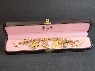 Pulsera Juicy Couture Oro Dije con 5 Dijes Malibú Loción, Zapatilla, Corazón 6.5"! Foto 1 de 4