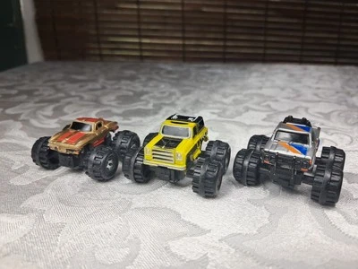 Micro Machine Monster Truck Lot Of 3,  Datsun Pickup, Corvette, and Chevy Blazer - Image 1 of 4