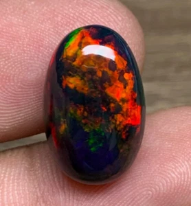 Cabujón de ópalo negro de alta calidad de 8,30 quilates, pin fuego negro ópalo Welo etíope, - Imagen 1 de 9