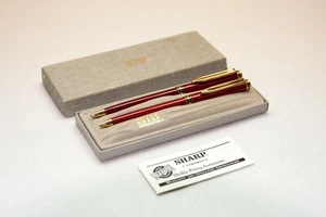 Elegante juego de escritura de bolígrafo y lápiz de metal internacional afilado de colección dorado rojo - Imagen 1 de 10