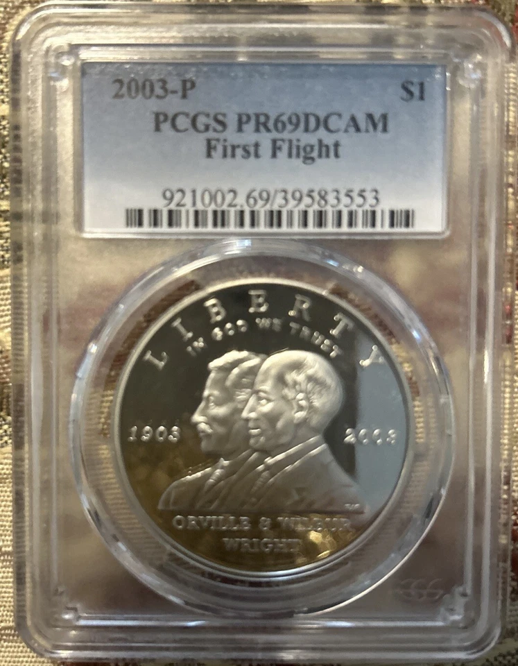 2003 P First Flight Centennial Commemorative Silver Dollar PCGS MS69 - Image 1 of 2