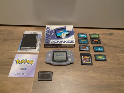 Nintendo GameBoy Advance Clear Glacier AGB-001 + 8 JUEGOS + CAJA Lote Probado Paquete Foto 1 de 4