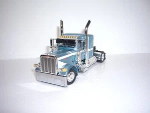 DCP FIRST GEAR 1/64 PACIFIC BLUE PETERBILT 389 WITH 36" SLEEPER - Picture 1 of 5