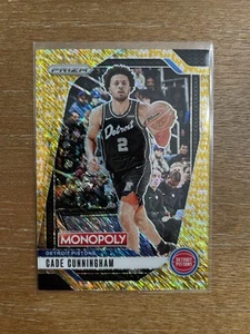 Prizm NBA Monopoly Cade Cunningham Gold Shimmer Millionaire Prizm/500 2024-25 - Imagen 1 de 11