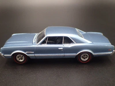 1966 66 OLDS OLDSMOBILE 442 BLU MODELLO DIECAST IN SCALA 1/64 DIORAMA LIMITATO - Immagine 1 di 4