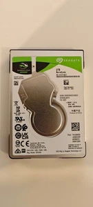 Seagate BarraCuda ST2000LM015 2TB SATA 7mm 2.5" HDD. Only 30-65 hours of usage! - Picture 1 of 24