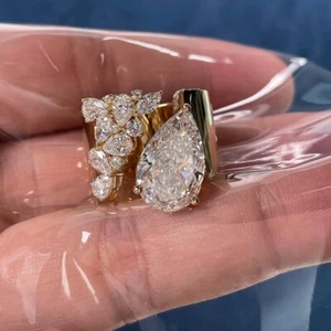 4,50 ct Laborgefertigter Ehering & Verlobungsring im Birnenschliff 14 kt Gelbgold-Finish - Bild 1 von 5