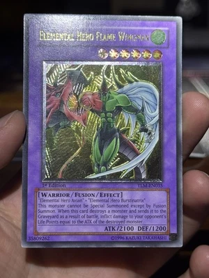 Yugioh Elemental Hero Flame Wingman TLM-EN035 Ultimate 1st Ed Silver Stamp UDE - Image 1 of 4