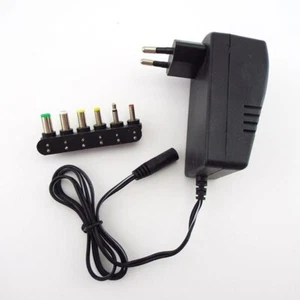 Alimentatore caricabatterie adattatore spina viaggio AC/DC 3V 4,5V 5V 6V 7,5V 9V 12V 2,5A - Foto 1 di 6