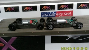 2 AFX RACING H.O. SCALE MEGA G+ 1.7 NARROW CHASSIS MIX 2 RED CAM 6-8% FAST - Picture 1 of 5