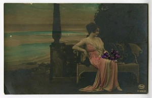 RPPC Woman on Couch at Seaside Sunset 1910 AMAG Germany Hand Colored - Picture 1 of 1