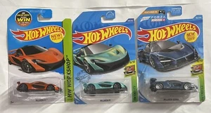 2 Hot wheels McLaren P1, & 1 SENNA with damage blister card See PICS for Damage - Picture 1 of 6