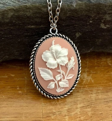 Hibiscus Cameo Vintage Necklace Pendant, White on Soft Peach / Pink Background - Image 1 of 4