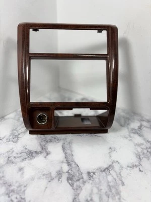 Radio bisel Mitsubishi Montero 1992-1995 borde climático marrón/grano madera OEM USADO  Foto 1 de 4