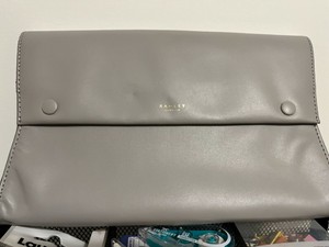 grey clutch