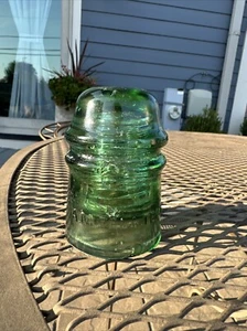 Antique Glass Insulator AM. Tel. & Tel. Co Green - Picture 1 of 10