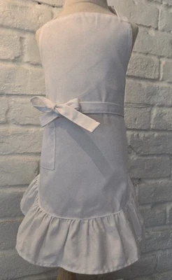 Delantal infantil con volante Foto 1 de 4