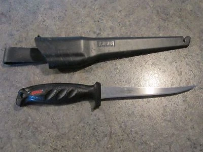 Vintage RAPALA  10 13/16" Fixed blade stainless fillet knife in plastic sheath  - Image 1 of 4