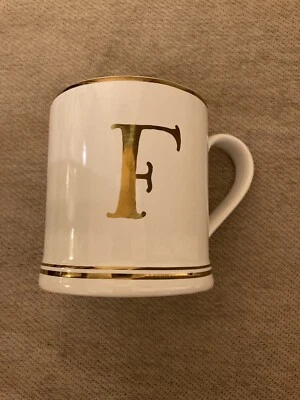 TAZA DE CAFÉ SUR LA TABLE DORADA CON MONOGRAMA F GRES ARTESANAL NUEVA Foto 1 de 2