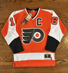 Mitchell & Ness Philadelphia Flyers Bobby Clarke Size Large BLUE LINE Jersey NWT - Picture 1 of 10