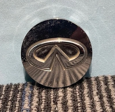 Tapacubos tapacubos 2-1/8" 40343-1VW5A Infiniti G35 G37 M45 Q45 I30 Q50 Q60 Foto 1 de 2